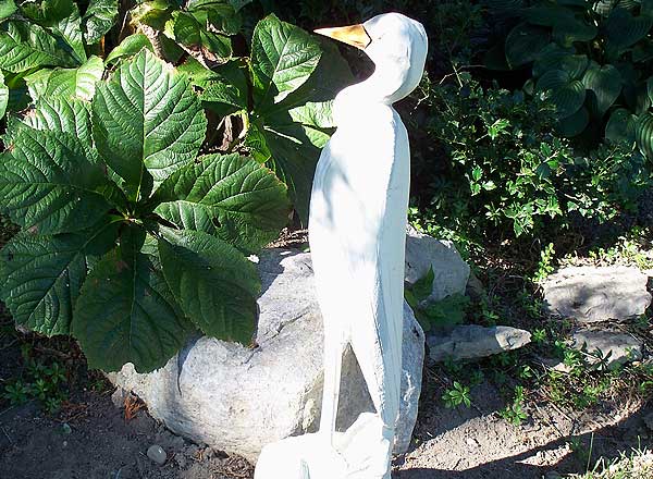 Garden decor - carving of a white bird